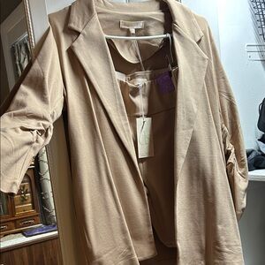 Chic Tan Blazer and matching magic pants size small. Sold as set.
